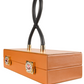Sac femme haut de gamme en cuir caramel avec poignée noire